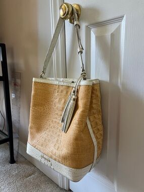 Brahmin Tan Amelia Woven Shoulder Bag with Cream Trim and Tassel.